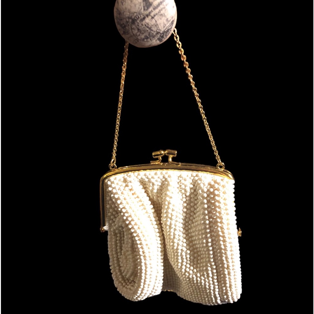 A vintage little purse with beads on the outside great condition